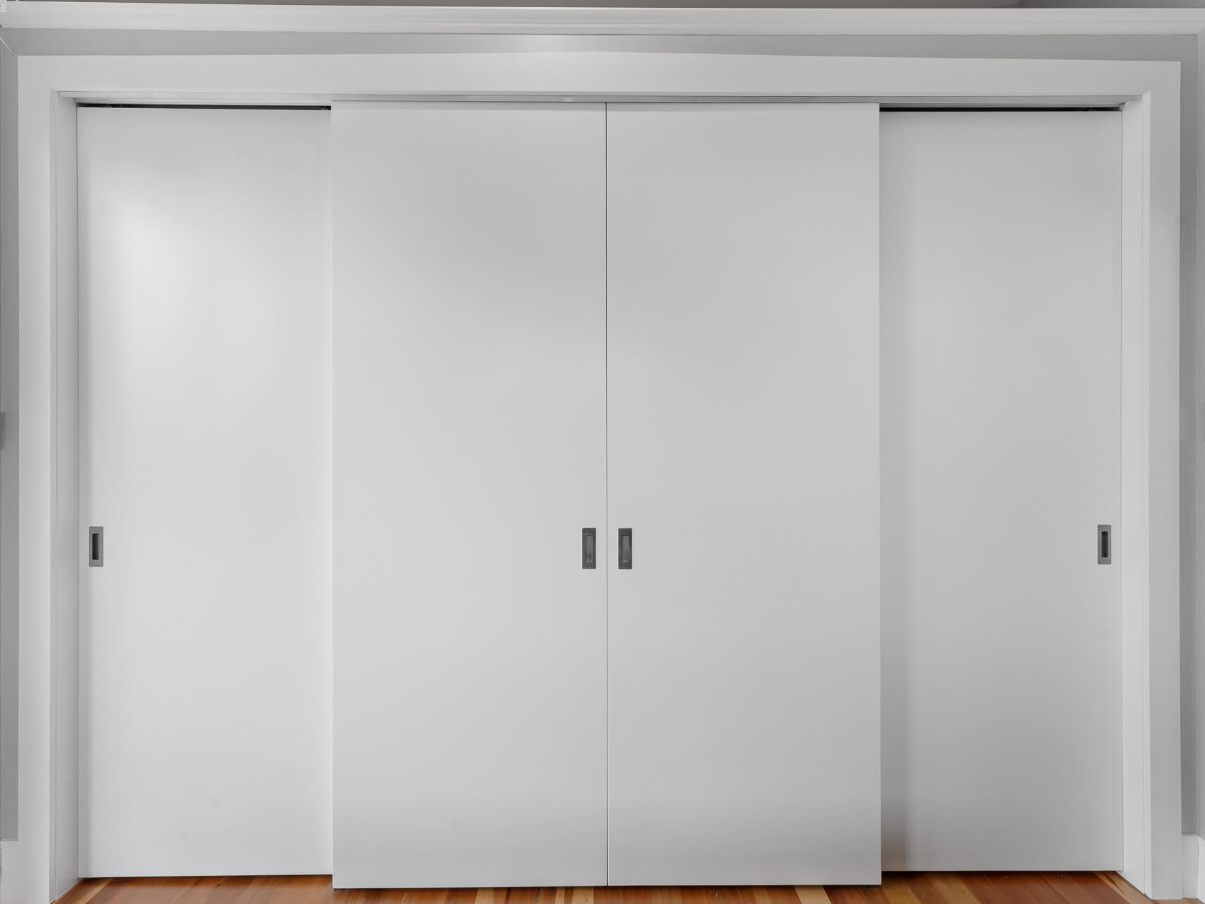 Flush Panel sliding wardrobe doors in white