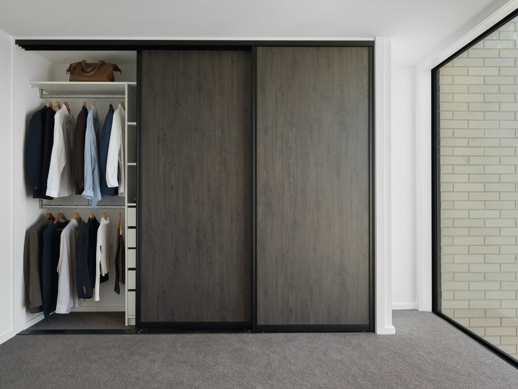 Aristo sliding wardrobe doors and Flex reach-in wardrobe organsier