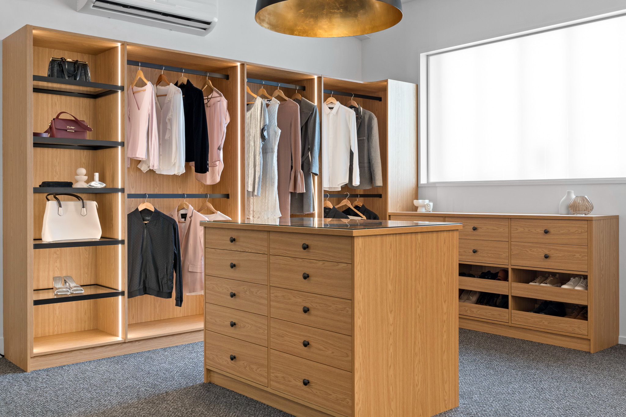 Luxe Walk-in Wardrobe with glass shelves and drawer island