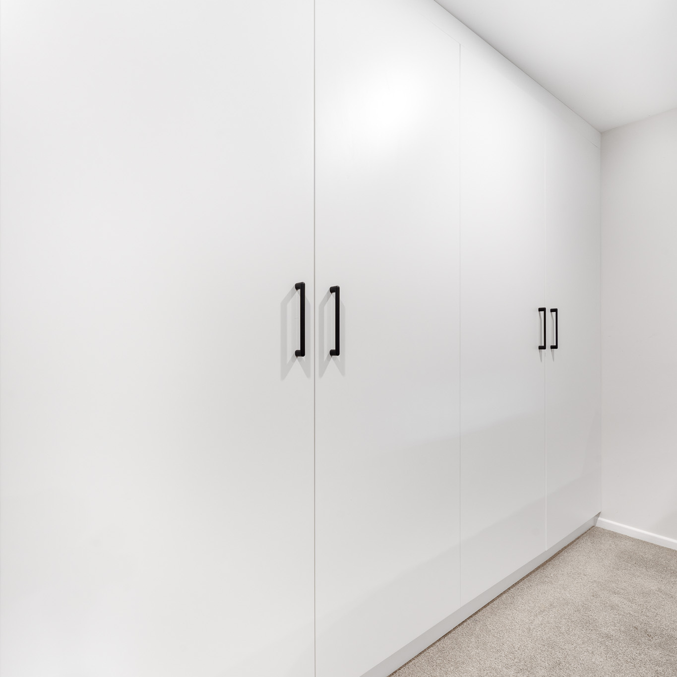 Viva freestanding wardrobe with hinged doors in white melamine